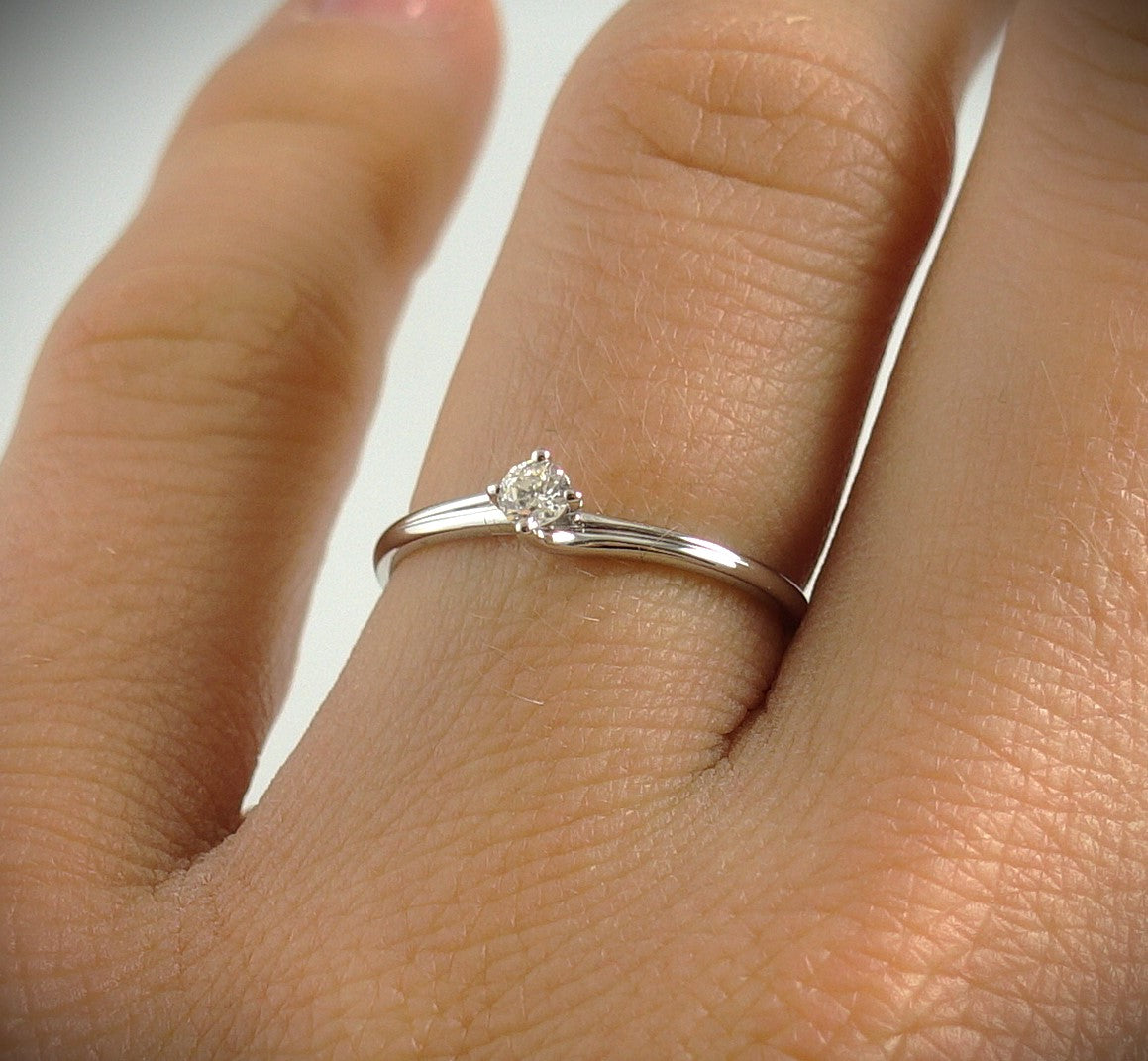 Ring 585 Weißgold 0,11 ct Brillant Ringgröße 54