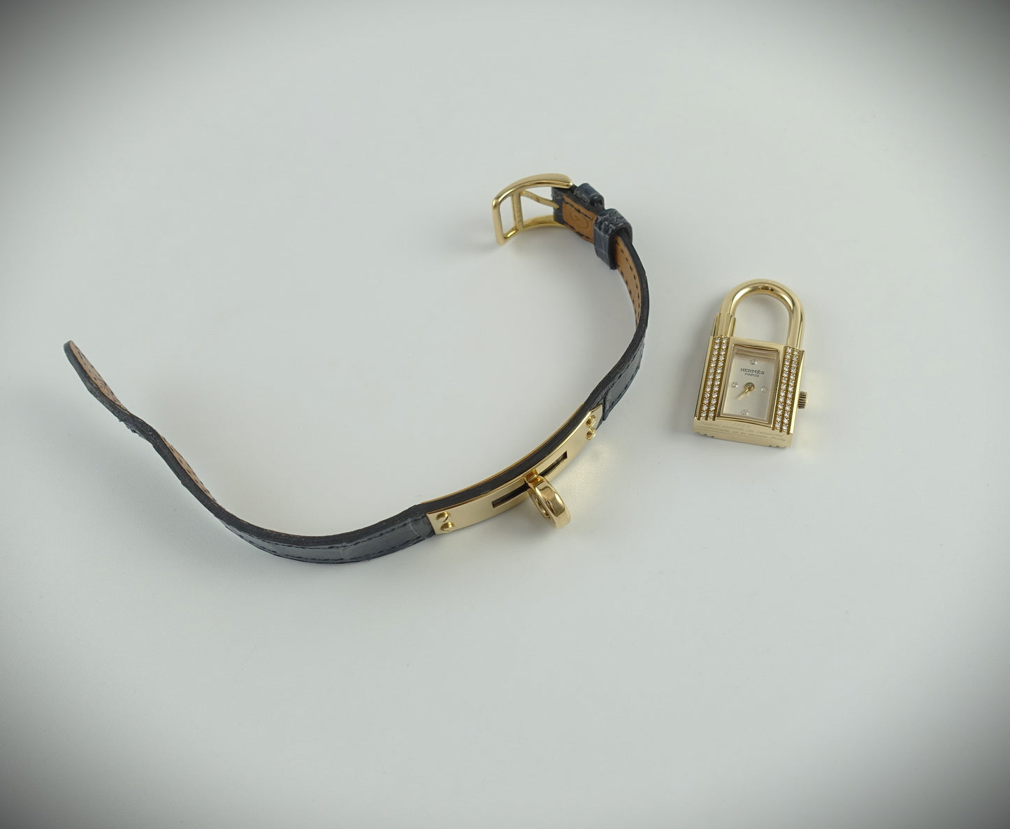 Hermès Kelly Lock Armbanduhr Limitiert 1995 18Krt. Gelbgold Brillanten blau