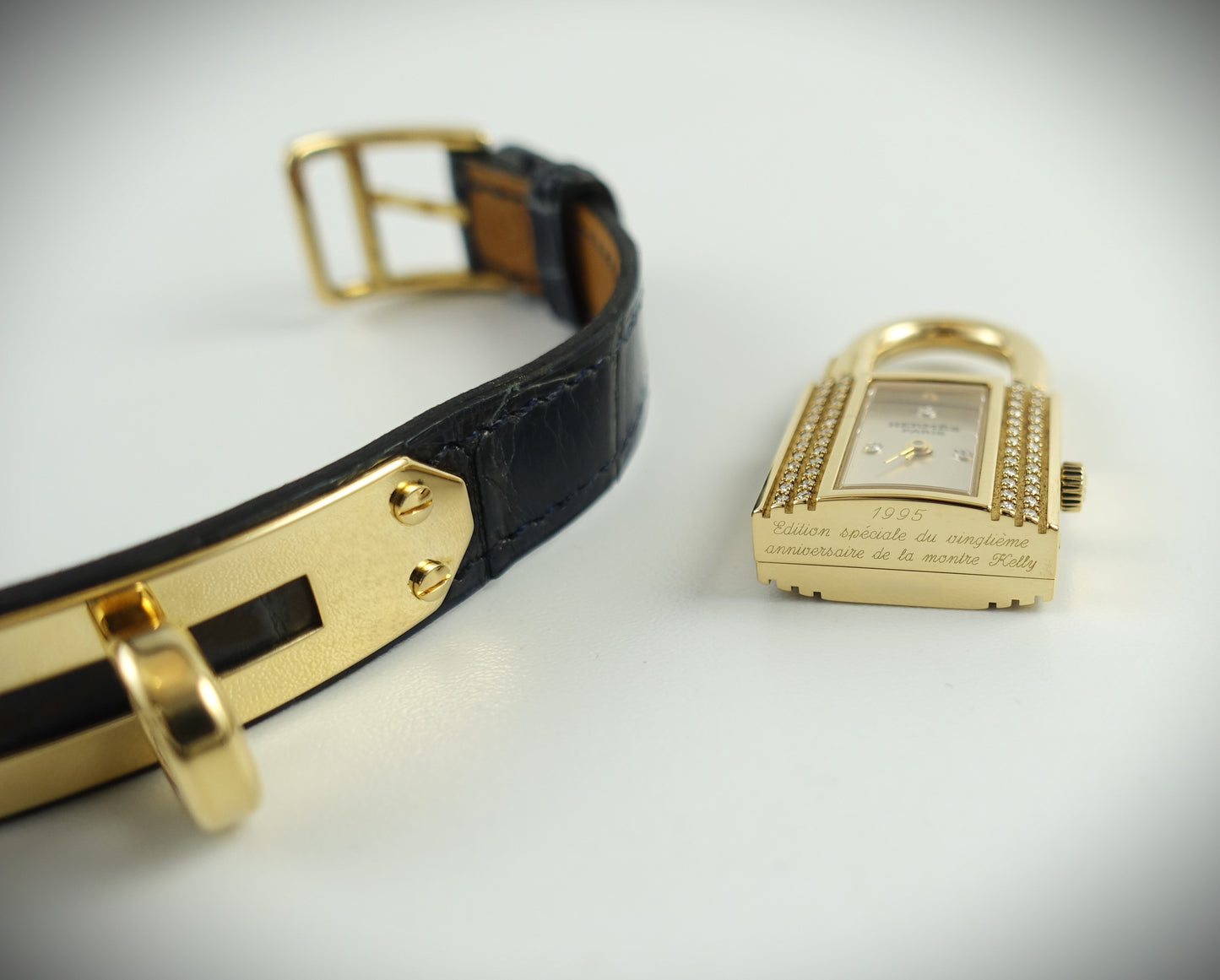 Hermès Kelly Lock Armbanduhr Limitiert 1995 18Krt. Gelbgold Brillanten blau