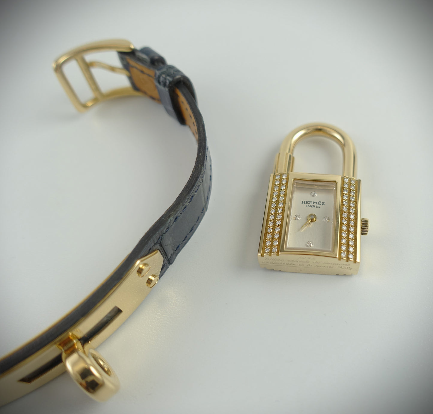 Hermès Kelly Lock Armbanduhr Limitiert 1995 18Krt. Gelbgold Brillanten blau