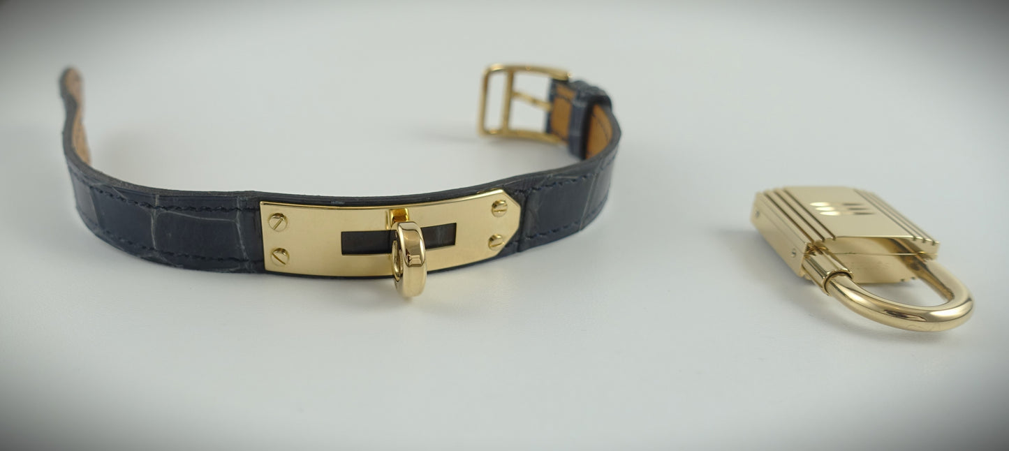 Hermès Kelly Lock Armbanduhr Limitiert 1995 18Krt. Gelbgold Brillanten blau