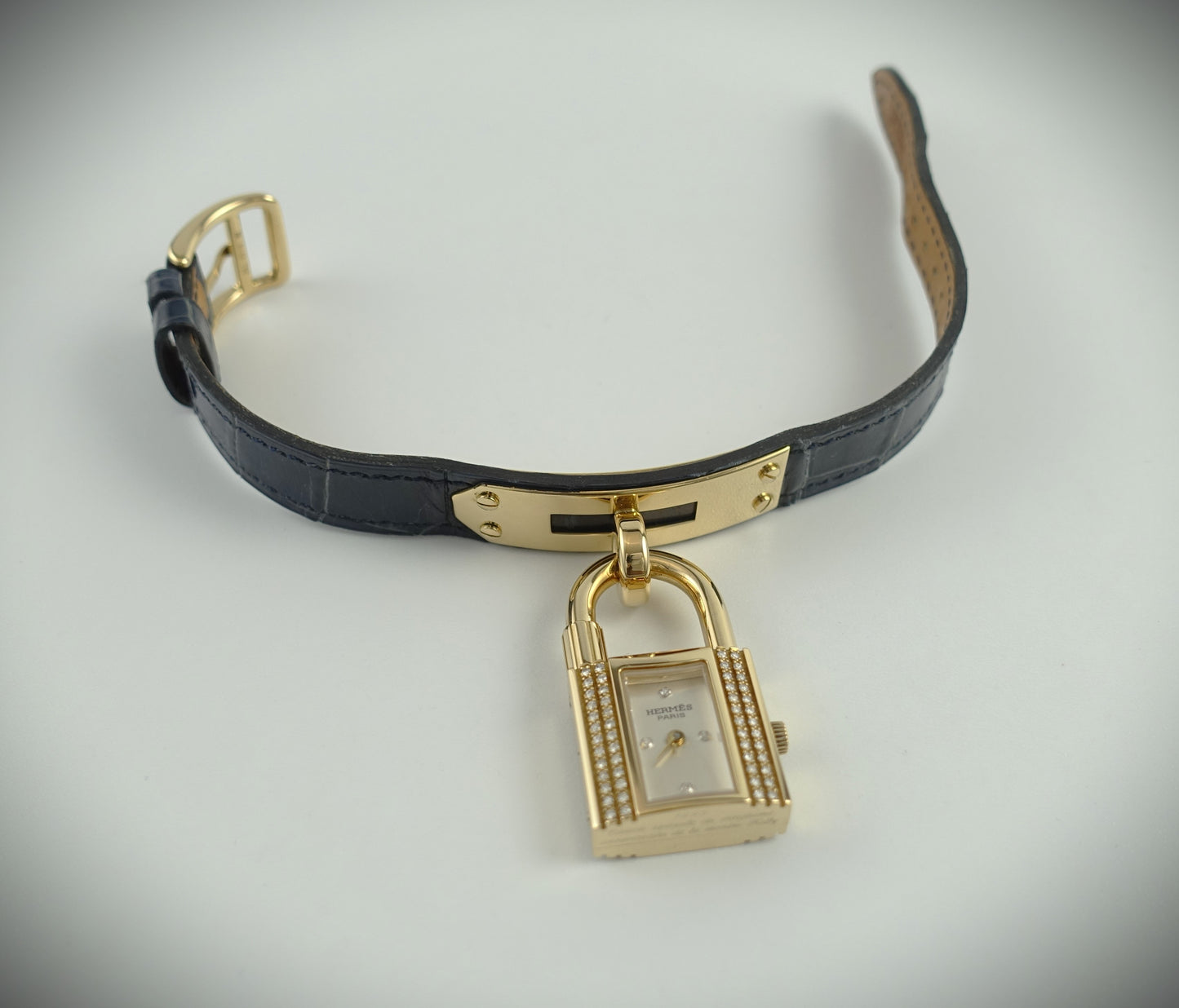 Hermès Kelly Lock Armbanduhr Limitiert 1995 18Krt. Gelbgold Brillanten blau